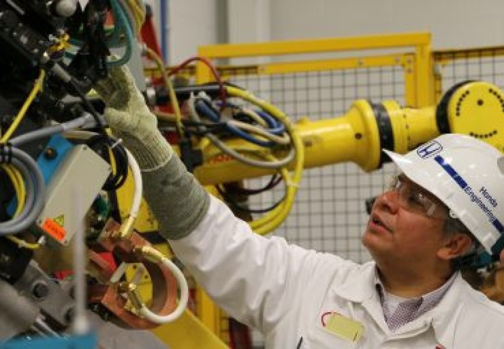 A Honda employee working in a facility.