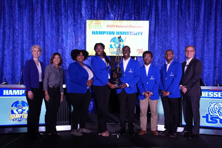 Hampton University students accepting an award.